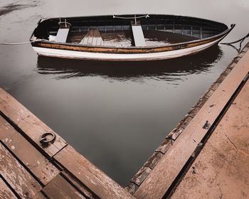 High angle view of abandoned boat moored in lake