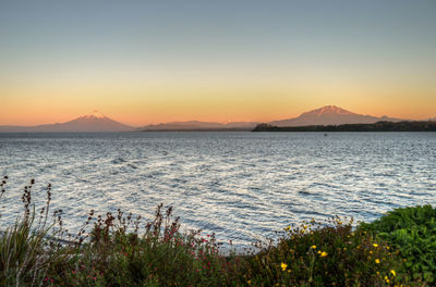 Scenic view of sea against sky during sunset