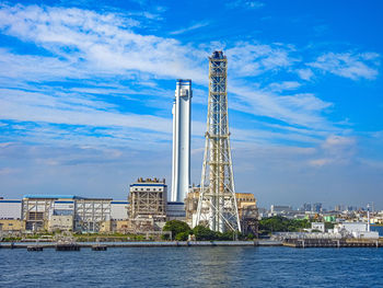 Communications tower against blue sky