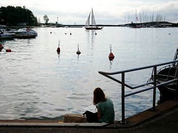 People sitting on a lake
