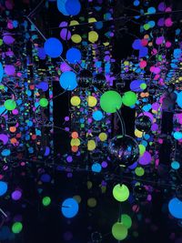 Low angle view of illuminated lanterns hanging on ceiling