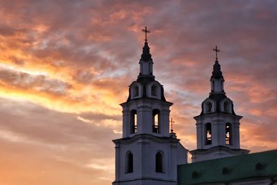 Low angle view of building against sky during sunset