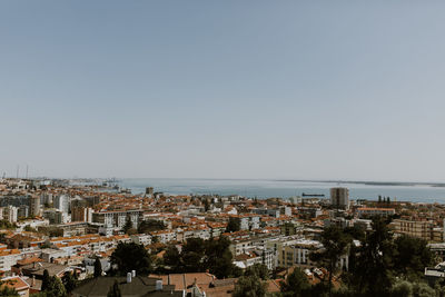 High angle shot of cityscape against clear sky