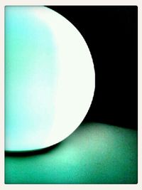 Close-up of bottle on the wall