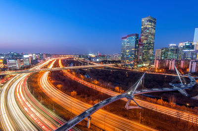 High angle view of illuminated city at night