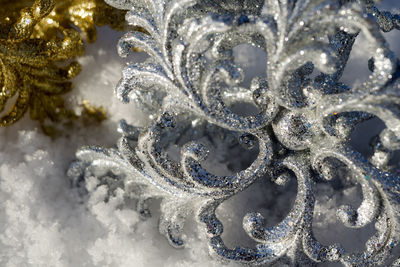 Close-up of frozen christmas tree during winter