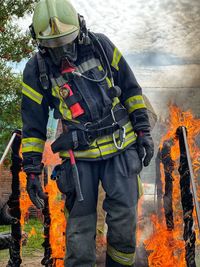 Panoramic view of men standing against fire hydrant