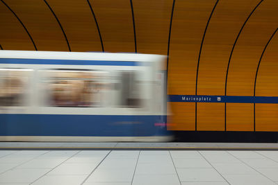 Blurred motion of train at subway station