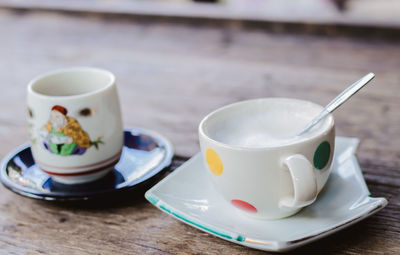 Close-up of coffee in cup on table