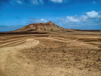 Scenic view of desert against sky