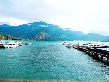 Scenic view of sea against cloudy sky