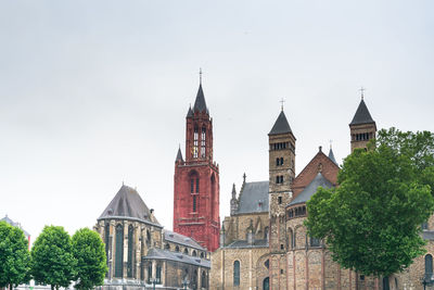 Low angle view of historic church against sky