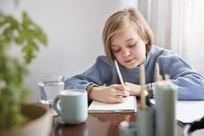 Girl doing homework at home