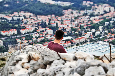Man looking at townscape