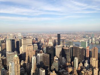 High angle view of modern buildings in city against sky