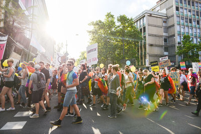 Crowd on street in city