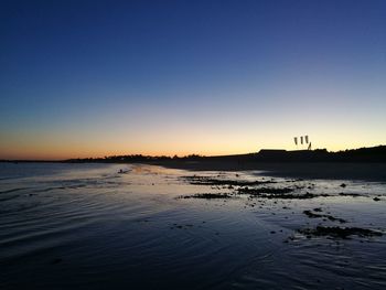 View of calm sea at sunset