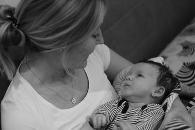 Close-up of woman holding son