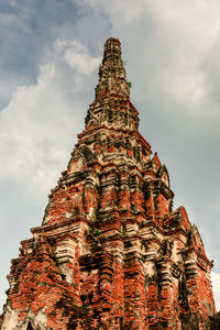 Low angle view of old building in ayutthaya province under the blue sky