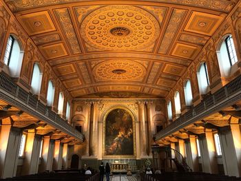 Low angle view of illuminated ceiling of building