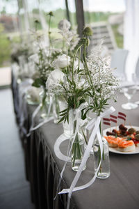 Wedding table setting and flora details,meal,place settings,centerpiece, floral arrangement