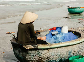 Woman working on beach