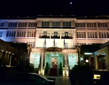 Buildings in city at night