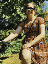 Portrait of young woman wearing sunglasses