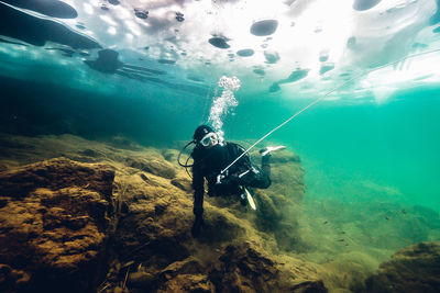 Man swimming in sea