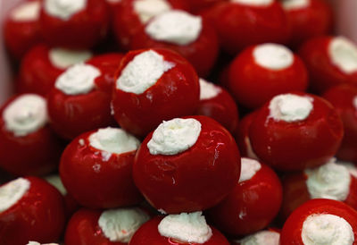 Close-up of stuffed red chili pepper for sale