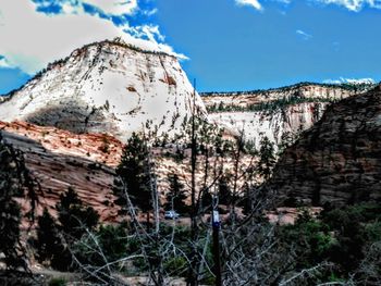 Scenic view of rocky mountains against sky