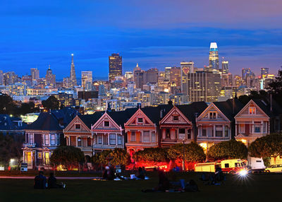 Buildings in city at dusk