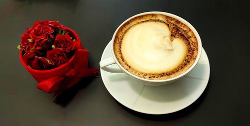 High angle view of cappuccino on table