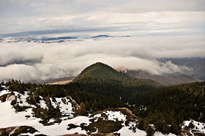 Scenic view of mountains against sky during winter