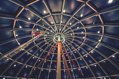 Low angle view of illuminated ceiling