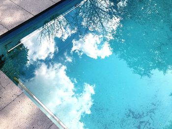 High angle view of swimming pool by sea against sky