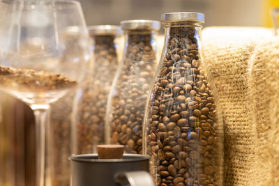 Close-up of drink in glass jar on table