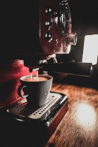 Close-up of coffee cup on table