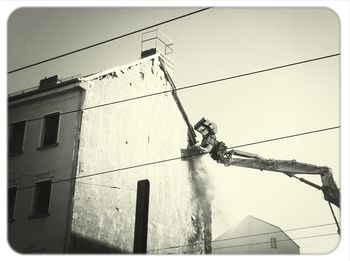 Low angle view of power lines