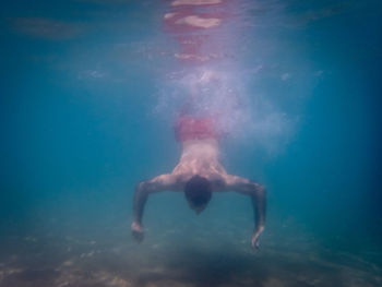 Man swimming in sea