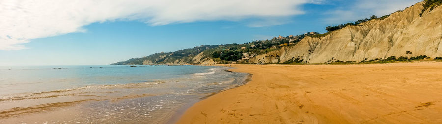 Scenic view of beach against sky