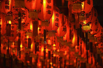 Low angle view of illuminated chinese lanterns at night