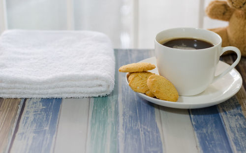 Close-up of coffee cup on table