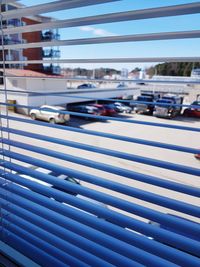 Close-up of cars on road