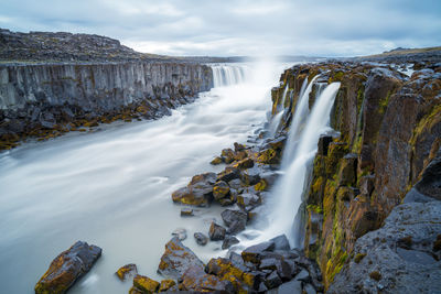 Long exposure of selfoss waterfall in iceland on a cloudy, rainy day. 