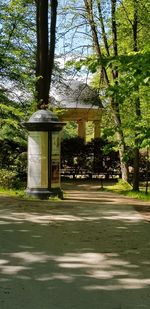 Built structure by trees in park