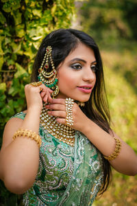 Young woman wearing traditional clothing outdoors