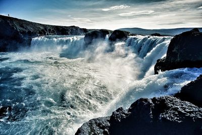 Scenic view of godafoss falls against sky