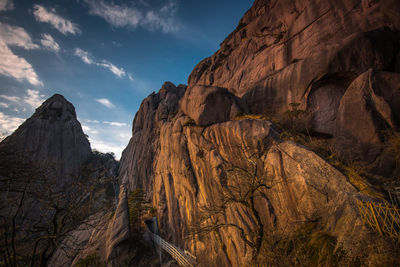 Panoramic view of rocky mountains against sky