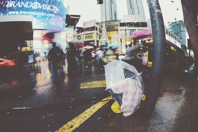 Wet street in city during rainy season